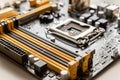 Part of the motherboard with a slot for placing RAM modules against the background of a blurred processor socket Royalty Free Stock Photo
