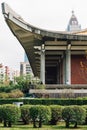 Part of The National Dr. Sun Yat-Sen Memorial Hall with tourists and buildings in background in Taipei, Taiwan