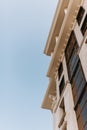 Part of a new modern building against a blue sky background Royalty Free Stock Photo