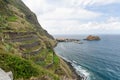 Part of the northern coast with the town of Porto Moniz and the island of Ilheu Mole. Madeira, Portugal, Europe