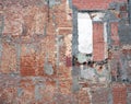 Part of old derelict brick wall after demolition work