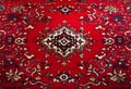 Part of Old Red Persian Carpet Texture, abstract ornament Royalty Free Stock Photo