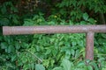 Part of the old rusty brown iron pipe railings on the street Royalty Free Stock Photo