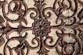 Part of rusty ornamental metal fence