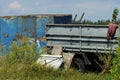 Part of an old truck made of iron gray side of the body