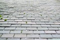 Part of an old weathered slate tile roof as a background.Closeup detail pattern of grey stone tiles Royalty Free Stock Photo