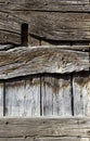 Part of old weathered wooden door with hand forged nails Royalty Free Stock Photo