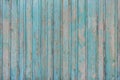 Part of an old wooden fence painted with green paint as a background Royalty Free Stock Photo