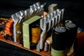 Part of pc power supply with radiator and electronic board with integrated stabilizers and filter capacitor with coils. Royalty Free Stock Photo