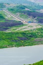 Part of a pit with big mining truck working. Coal mining at an open pit Royalty Free Stock Photo