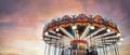 Part of popular vintage carousel (merry-go-round) by the Eiffel Tower in Paris on sky sunset background. France. Royalty Free Stock Photo