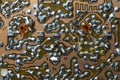 A part of a printed circuit computer board with tracks. PCB without radio components. Old printed circuit board background with Royalty Free Stock Photo