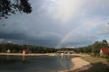 Part of Rainbow above lake of recreation area Landgoed `t Loo in the Netherlands