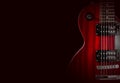 Part of the red electric guitar on black background. A place for writing of the text. Royalty Free Stock Photo