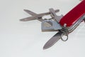 Part of red swiss pocket knife on white background Royalty Free Stock Photo