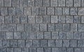 Part of a road made up of square stone tiles. Royalty Free Stock Photo