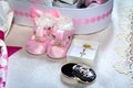 The pink bootees for baby baptism party shower in Romanian tradition celebration Royalty Free Stock Photo