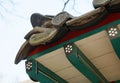 Part of the roof of an ancient Korean palace building. Royalty Free Stock Photo