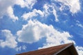 Part of roof and cloudy sky Royalty Free Stock Photo