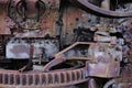 Part of rusty damaged machinery on steam agricultural tractor
