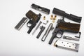 Guns , Part of Semi automatic pistol handguns with .45 bullets on white background , The same of single action operating system Royalty Free Stock Photo