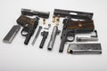 Part of Semi automatic pistol handguns with .45 bullets on white background , The same of single action operating system , 1911 Royalty Free Stock Photo
