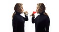 Part of series. Self talk concept. Portrait of young woman talking to herself in mirror, drinking milk or wine in glass