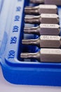 part of A set of single-sided chrome steel bits in a blue plastic box Royalty Free Stock Photo