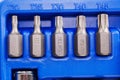 part of A set of single-sided chrome steel bits in a blue plastic box Royalty Free Stock Photo
