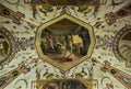Part of a small room, at the Uffizi museum in Florence. In the fresco in the center, a scene that represents the hot working of st
