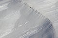 Part of a snowy mountain aerial photo without people and sky.