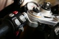 Buttons on the left handlebar of superbike. button of abs system on motorcycle. Royalty Free Stock Photo