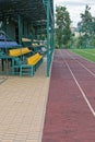 Part of the stadium with a brown running track