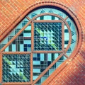 Part of stained glass arched window