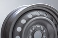 Part of Steel wheel rim on grey background Royalty Free Stock Photo