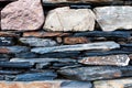 Part of stone wall at Gergeti trinity church or Tsminda Sameba, Georgia. Royalty Free Stock Photo