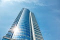 Part of a super modern business building against the blue sky Royalty Free Stock Photo