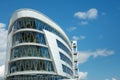 Part of a super modern business building against the blue sky Royalty Free Stock Photo