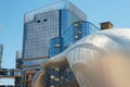 Part of a super modern business building against the blue sky Royalty Free Stock Photo