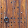 part of thick very old wooden door of church or medieval building Royalty Free Stock Photo