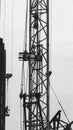 Part of tower crane and industrial climber worker working at height Royalty Free Stock Photo