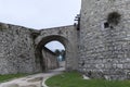 Part of a tower and a gate conneting to the wall of Brescia cast Royalty Free Stock Photo