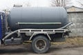 Part of a truck made of a gray iron barrel