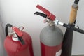 Two red fire extinguishers, water and CO2  in stand with instructions Royalty Free Stock Photo