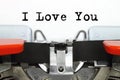 Part of typing machine with typed I Love You words Royalty Free Stock Photo