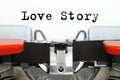 Part of typing machine with typed Love Story words Royalty Free Stock Photo