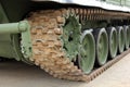 Part of the undercarriage of tracked military equipment, close-up Royalty Free Stock Photo