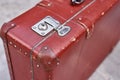 Part of vintage retro suitcase. Closeup view of lock on old suit case