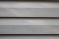Part of wall from plastic siding close up Royalty Free Stock Photo