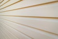 Plastic beige siding Royalty Free Stock Photo